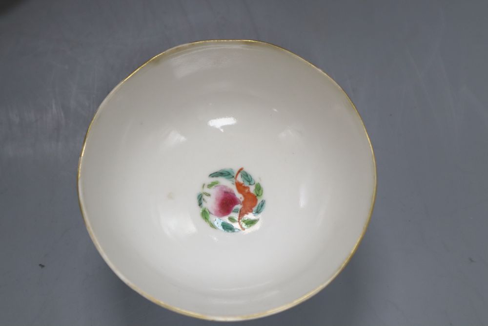 Three Chinese saucers and two teacups and a tea bowl, largest diameter 12.5cm